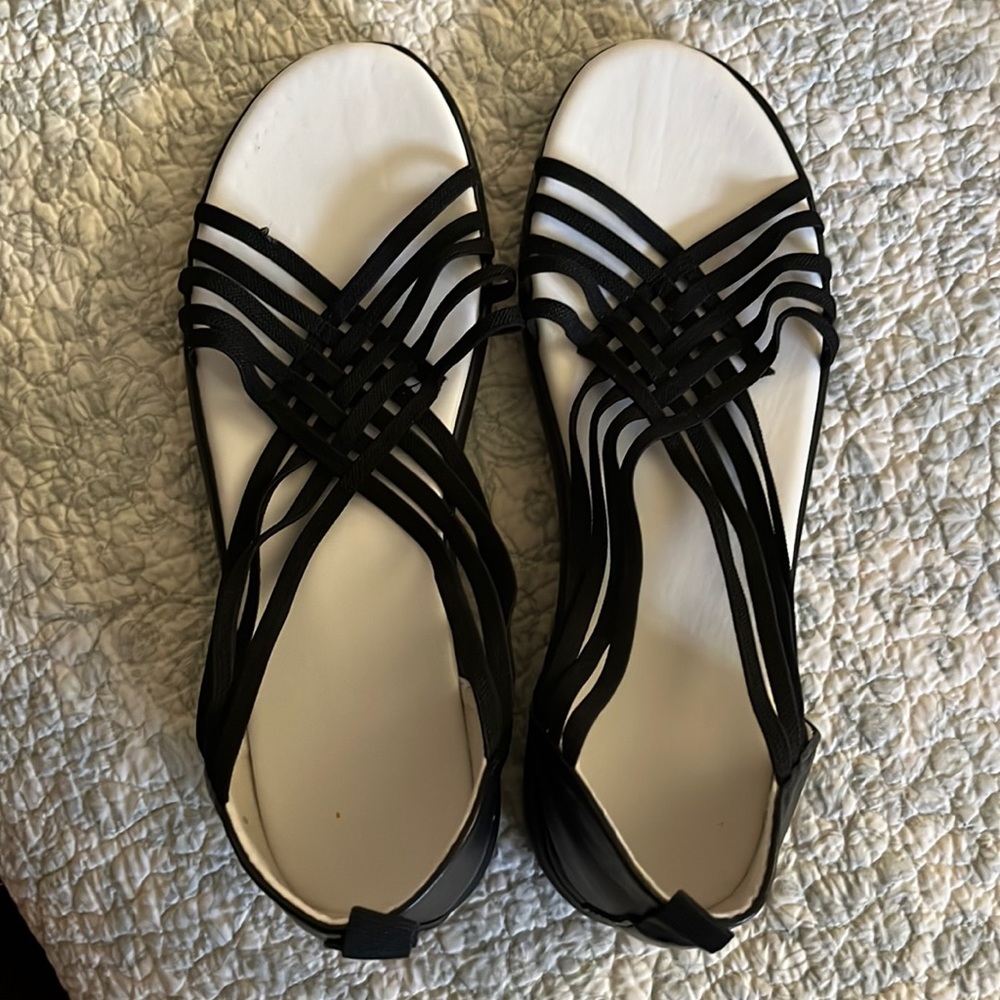 Black shoes. Elastic top. Excellent condition. Never worn.